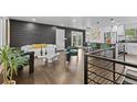 Spacious living room featuring modern decor and an open floor plan at 982 S Holly St, Denver, CO 80246