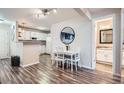 Bright dining area adjacent to the kitchen with white table set at 7895 Allison Way # 203, Arvada, CO 80005