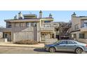The property's charming exterior, with a car parked nearby at 1830 Newland Ct # 109, Lakewood, CO 80214