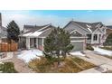 Lovely single Gathering home with a manicured front yard, inviting entrance and a two-car garage at 3906 S Quemoy Ct, Aurora, CO 80018