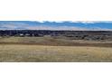 Sweeping landscape view showcases distant mountains and open plains at 4742 Raven Run, Broomfield, CO 80023