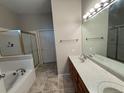 Spacious main bathroom with double sinks, soaking tub and separate shower at 9806 Hooker Ct, Westminster, CO 80031
