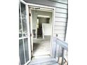 Open foyer with light gray flooring and staircase leading to the upper level at 4243 Flanders St, Denver, CO 80249