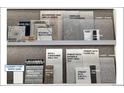 Selection of kitchen and bath materials showcasing tile, flooring, paint, cabinet, and countertop samples at 5851 Las Rosas Dr, Parker, CO 80134