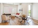 Bright living room with modern furniture, large windows, and stylish decor at 1208 Quitman St # 305, Denver, CO 80204