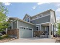 Charming two-story home featuring stone accents, neutral siding and a two-car garage with extended driveway at 3871 Starry Night Loop, Castle Rock, CO 80109