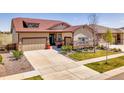 Attractive single-Gathering home with a well-maintained front yard and convenient driveway at 6450 S Riverwood Ct, Aurora, CO 80016