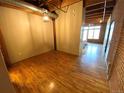 Bright dining area with hardwood floors and exposed beams at 2960 Inca St # 319, Denver, CO 80202