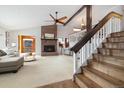 View of the staircase leading to the upper level at 16587 W 53Rd Way, Golden, CO 80403