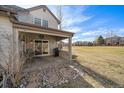 Private patio with grill and stone pathway, overlooking a golf course at 2181 S Victor St # D, Aurora, CO 80014