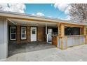 Stylish outdoor kitchen with stainless steel appliances, modern countertops, and ample counter space at 948 S Tennyson St, Denver, CO 80219