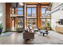 Open living space showcasing high ceilings and exposed ductwork at 2955 Inca St # 1D, Denver, CO 80202