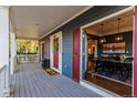 Lovely front porch leading into the dining room, showcasing outdoor access and a cozy aesthetic at 2843 Havana St, Denver, CO 80238