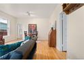 Open living area with hardwood floors and neutral color palette at 2339 Lowell Blvd, Denver, CO 80211