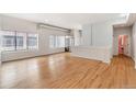 Bright living room with hardwood floors and large windows at 70 W 6Th Ave # 109, Denver, CO 80204