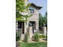 Beautiful exterior showcasing manicured landscaping, stone accents, and a welcoming front entry and porch at 3255 S Birch St, Denver, CO 80222