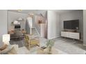 Bright living room featuring a cozy seating area and a functional work space at 4574 S Cimmarron Cir # B, Aurora, CO 80015