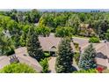 Expansive property showcasing mature trees and the house's attractive roofline at 400 S Steele St # 13, Denver, CO 80209