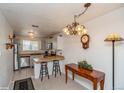 Eat-in kitchen with stainless steel appliances and breakfast bar seating at 8654 Decatur St # 251, Westminster, CO 80031