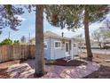 Cozy home exterior with stone walkway, and tasteful landscaping at 4290 S Cherokee St, Englewood, CO 80110