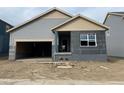 Charming single-Gathering home featuring a two-car garage, a covered porch and horizontal siding at 15275 Milwaukee St, Thornton, CO 80602