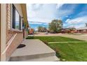 Charming home with a well-kept lawn and inviting curb appeal in a friendly neighborhood at 11241 Ogden Dr, Northglenn, CO 80233