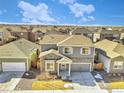 Aerial shot shows the beautiful neighborhood that the property resides in at 885 Hearthstone Ave, Brighton, CO 80601