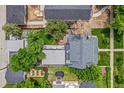 A top-down aerial view showcasing the home's backyard, deck, and landscaping at 2324 S Columbine St, Denver, CO 80210