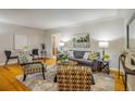 Comfortable living room with hardwood floors, stylish furnishings, and lots of natural light at 169 Emerald St, Broomfield, CO 80020