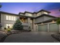 Beautiful home with three-car garage and well-maintained landscaping in a serene location at 6405 Eagle Feather Trl, Littleton, CO 80125