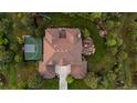 Stunning aerial view of the property highlighting the large backyard, basketball court, and entertainment space at 6122 Maroon Peak Pl, Castle Rock, CO 80108