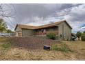 View of home with play structure, and attached garage and lovely exterior features at 11549 Haskell Creek Rd, Larkspur, CO 80118