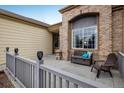 Inviting front porch with comfortable seating, offering a relaxing outdoor space at 13397 Franklin St, Thornton, CO 80241