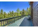 Relaxing outdoor deck area perfect for enjoying mountain views at 11333 Conifer Mountain Rd, Conifer, CO 80433