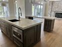 Contemporary kitchen featuring a large island, modern appliances, and an open layout perfect for entertaining at 5841 Powell Rd, Parker, CO 80134