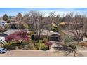 Charming single-story home with a well-maintained front yard and a two-car garage at 1746 Shavano St, Longmont, CO 80504