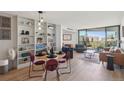 Open concept living space with a dining area and cozy living room at 550 E 12Th Ave # 810, Denver, CO 80203
