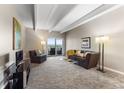 Bright living room with balcony access and mountain views at 130 N Pearl St # 805, Denver, CO 80203