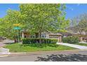 Charming single Gathering home on a corner lot featuring mature trees and beautiful landscaping at 6673 S Benton St, Littleton, CO 80123