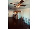 Eat-in kitchen with dark flooring and ceiling fan at 153 S Pierce St, Lakewood, CO 80226