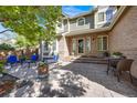 Inviting patio area with stylish outdoor furniture, perfect for relaxing and entertaining at 10188 Stephen Pl, Highlands Ranch, CO 80130