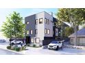 Stylish townhome with modern architecture, landscaping, and a well-maintained walkway at 2140 S Ash St # 102, Denver, CO 80222