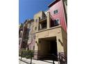 Building exterior featuring a private balcony and covered entryway with unit number 1062 at 1062 Rockhurst Dr # 302, Highlands Ranch, CO 80129