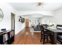 Open-concept living room with hardwood floors and modern decor at 489 S Gaylord St, Denver, CO 80209
