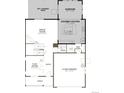 An open floor plan showcases a gourmet kitchen, a spacious great room, and a convenient mud room at 1391 Lumber Ridge N Cir, Erie, CO 80516