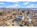 Aerial shot of a two-story home in a neighborhood near the city at 4520 W Moncrieff Pl, Denver, CO 80212