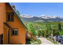 Charming home with a scenic mountain view, complemented by mature trees and a cozy deck at 422 Fairview Blvd, Breckenridge, CO 80424