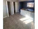 Bright kitchen with granite countertops and stainless steel appliances at 1240 Russell Blvd, Thornton, CO 80229
