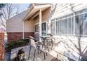 Private patio with table set; perfect for outdoor dining and relaxing at 5317 W Iliff Dr # 103, Lakewood, CO 80227