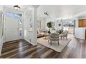 Bright living room with hardwood floors and modern furniture at 9980 W Jewell Ave # B, Lakewood, CO 80232